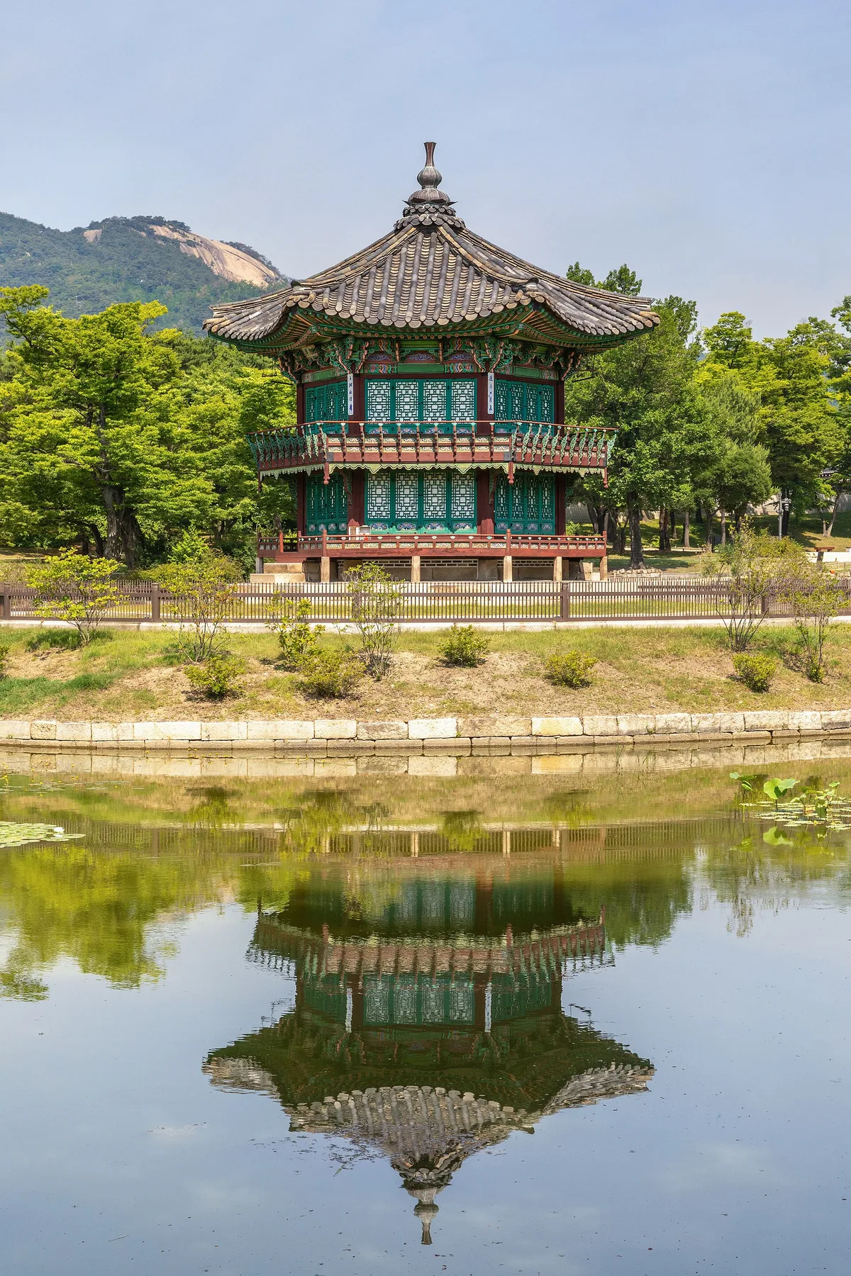 Hyangwonjeong pavilion reflected in its pond at Gyeongbokgung Palace, Seoul, South Korea